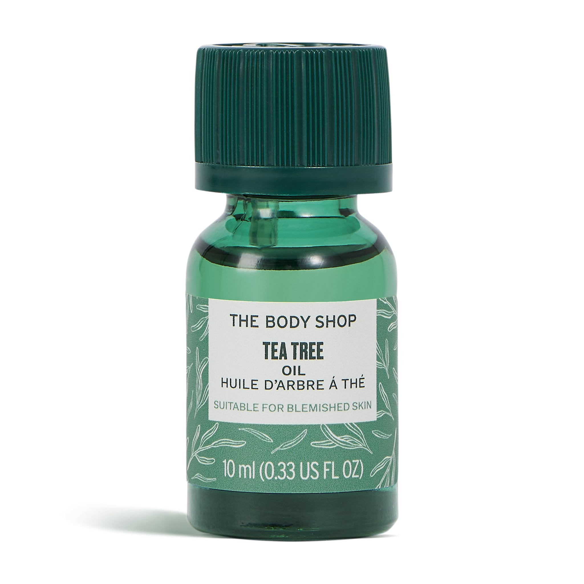 The Body Shop Tea Tree Oil bottle shows portable blemish-targeting care for on-the-go skin.