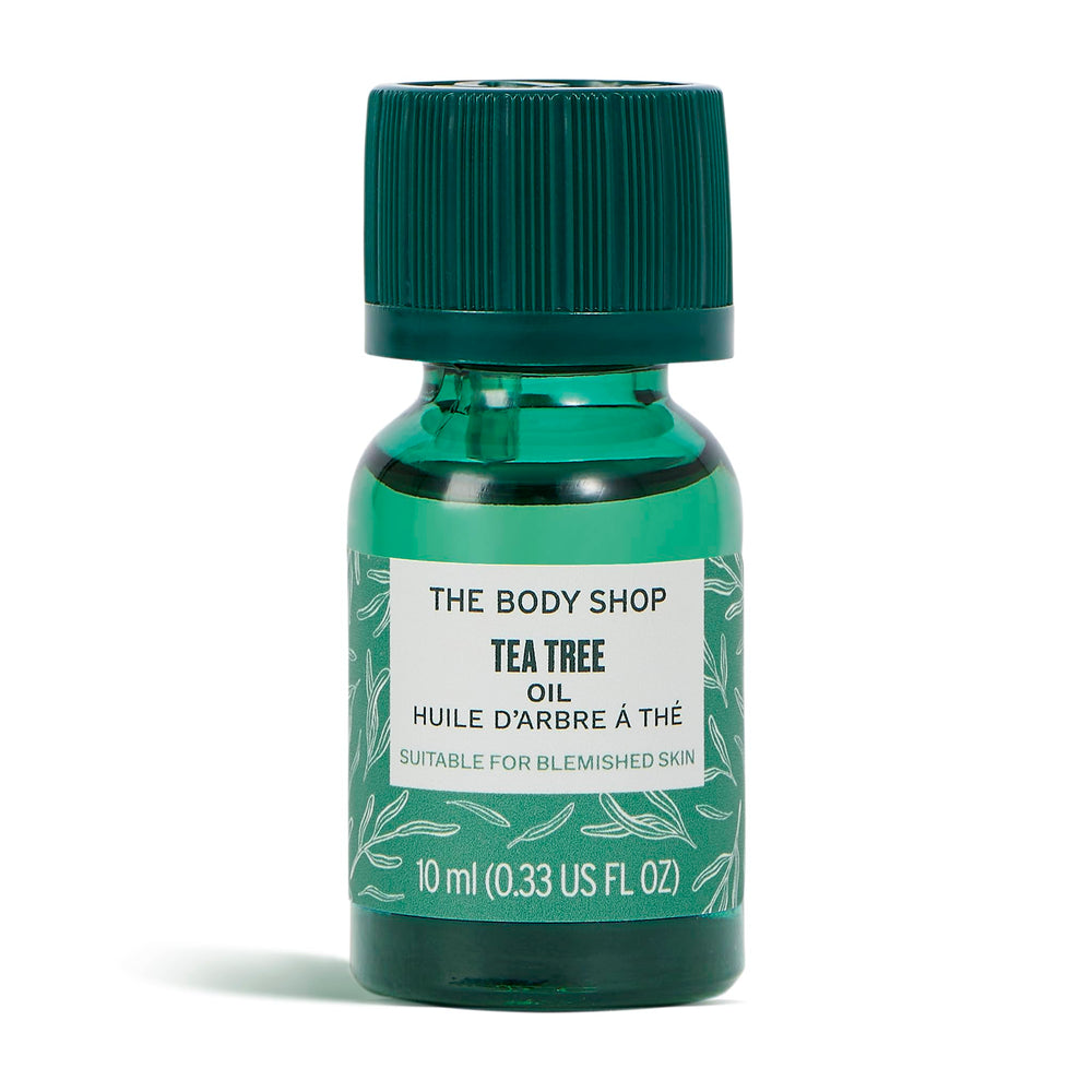 The Body Shop Tea Tree Oil bottle shows portable blemish-targeting care for on-the-go skin.