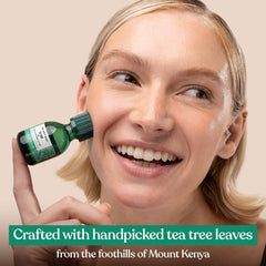 The Body Shop Tea Tree Oil packaging highlighting vegan, paraben-free formula