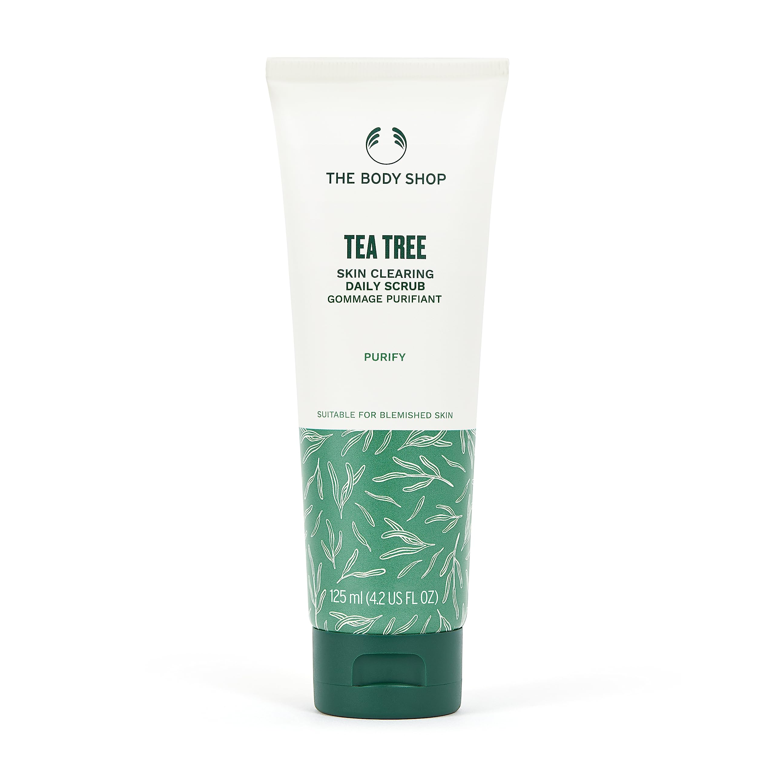 The Body Shop Tea Tree Skin Clearing Daily Scrub bottle closeup with gel texture for blemish-prone skin