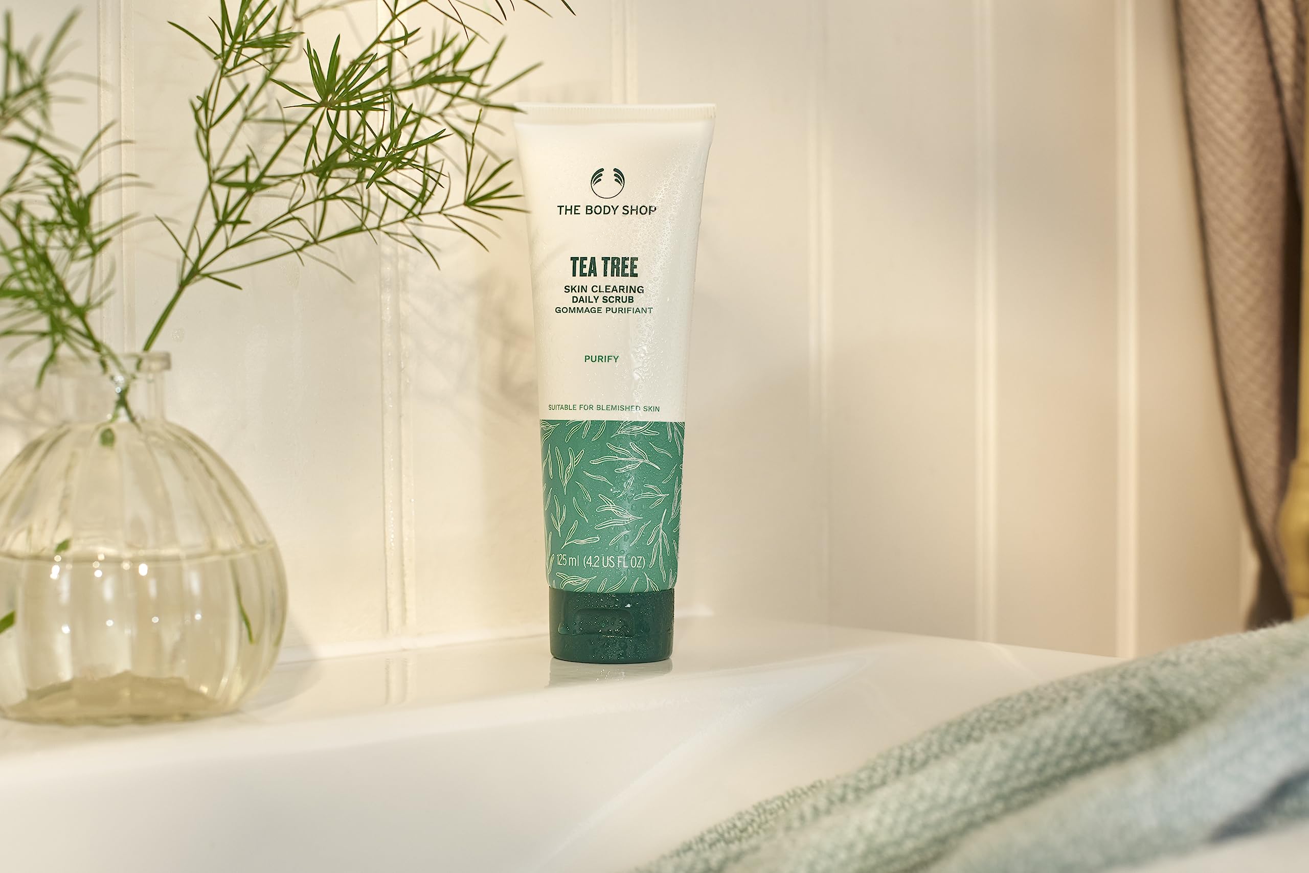 The Body Shop Tea Tree Scrub helps reveal a clearer, matte-looking complexion
