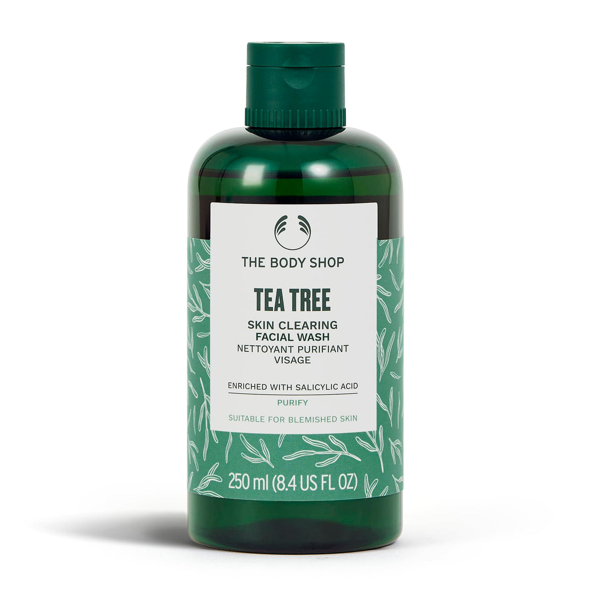 The Body Shop Tea Tree Skin Clearing Facial Wash bottle close-up, promoting balanced, clear-looking skin.