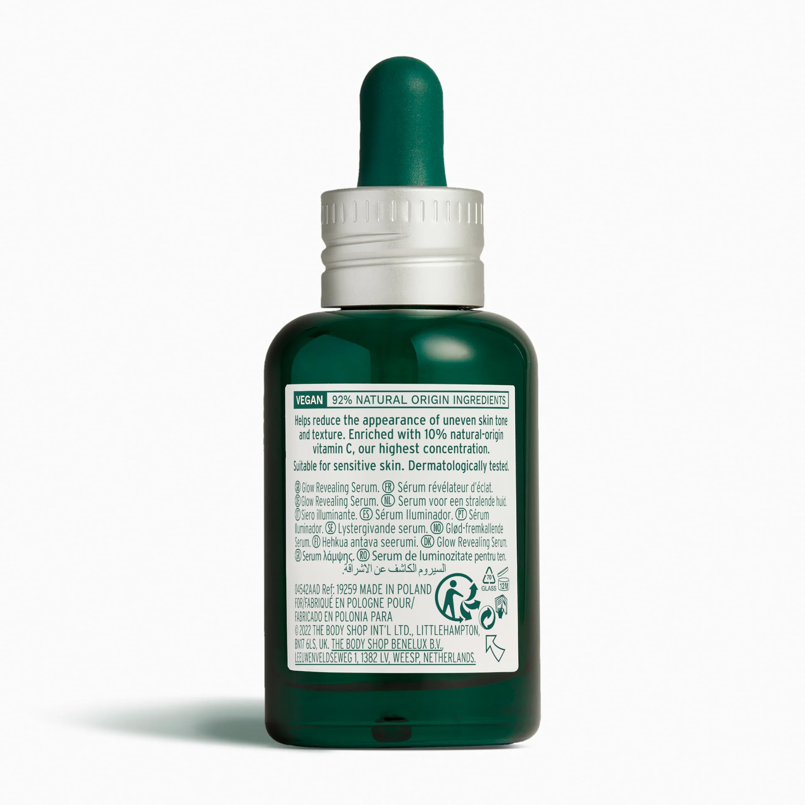Vitamin C serum dropper dispensing for radiant mornings by The Body Shop