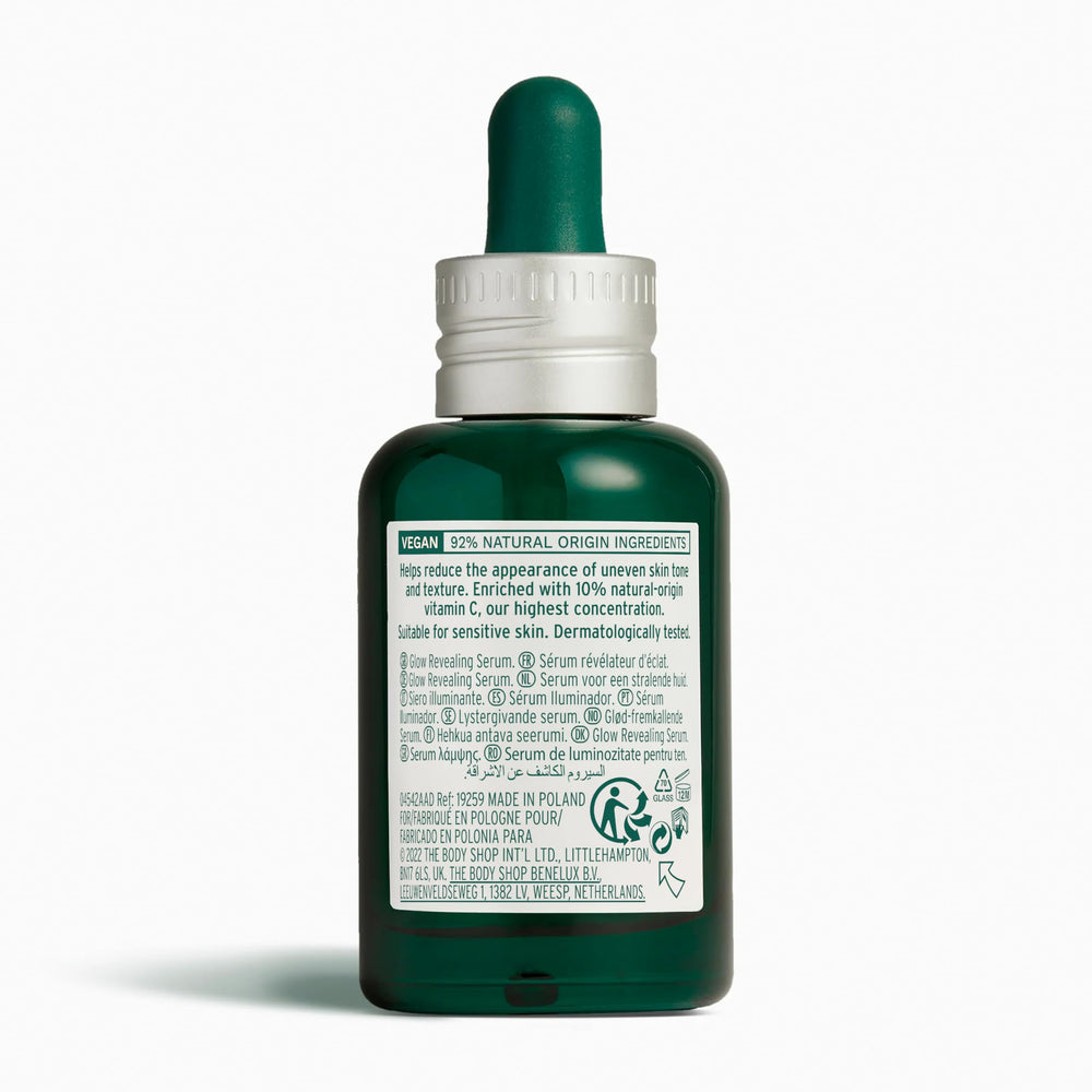 Vitamin C serum dropper dispensing for radiant mornings by The Body Shop