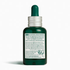 Vitamin C serum dropper dispensing for radiant mornings by The Body Shop