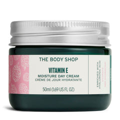 The Body Shop Vitamin E Moisture Cream jar close-up shows lightweight hydration.