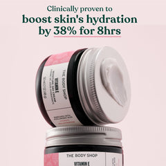 The Body Shop Vitamin E Moisture Cream packaging on display highlights oil-free freshness.