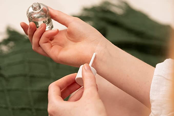 White Musk packaging shows recyclable bottle and cap for sustainable packaging.