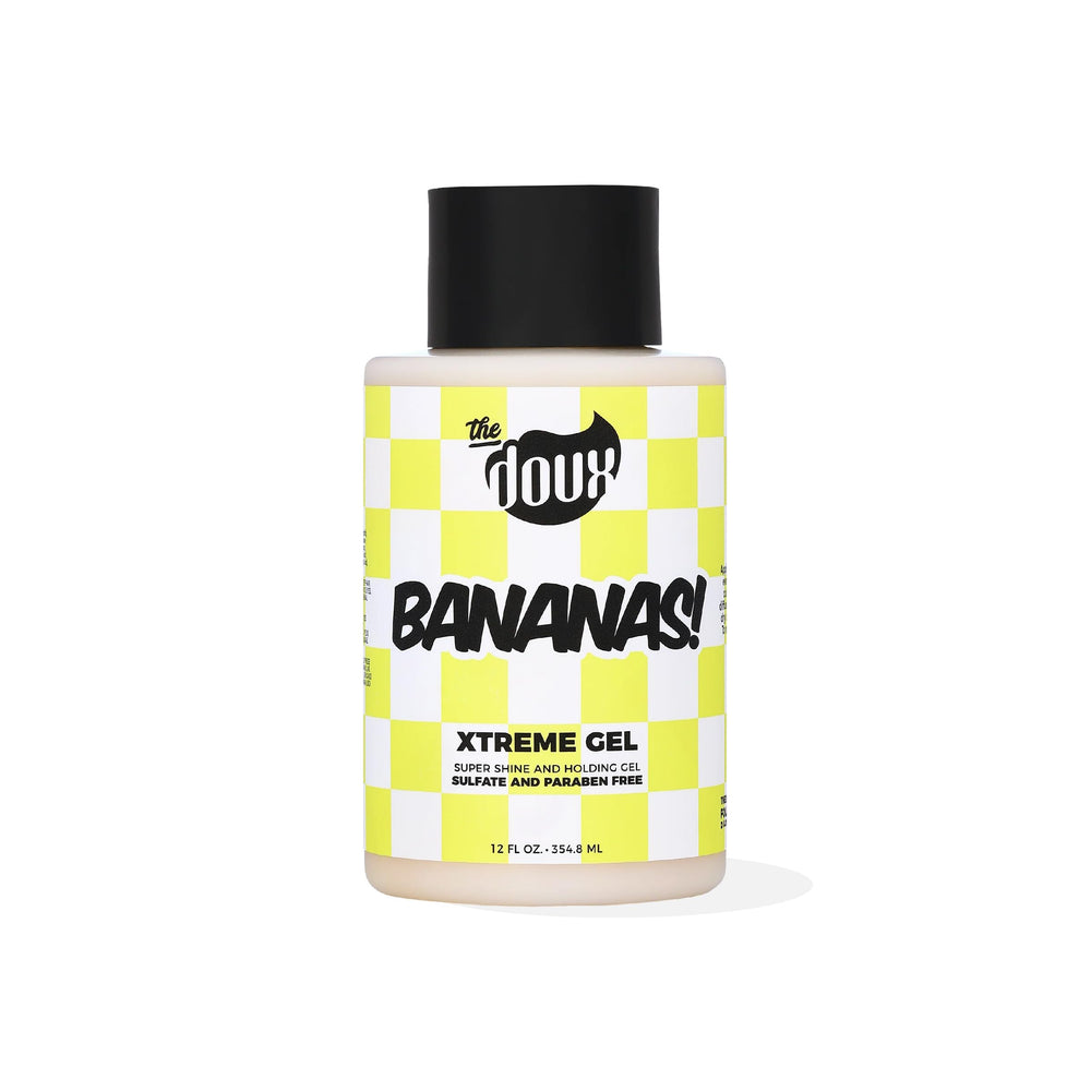The Doux Bananas Xtreme Hold bottle pour supports long-lasting hold on defined curls.