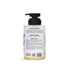 The Doux BREAKDOWN creamy lather on textured hair—gentle detangling.