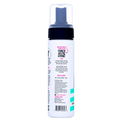The Doux multi-use mousse volume-boost adds fuller texture.