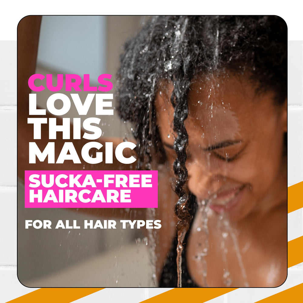 The Doux SUCKA FREE shampoo after-wash hair reflects defined, bouncy curls.