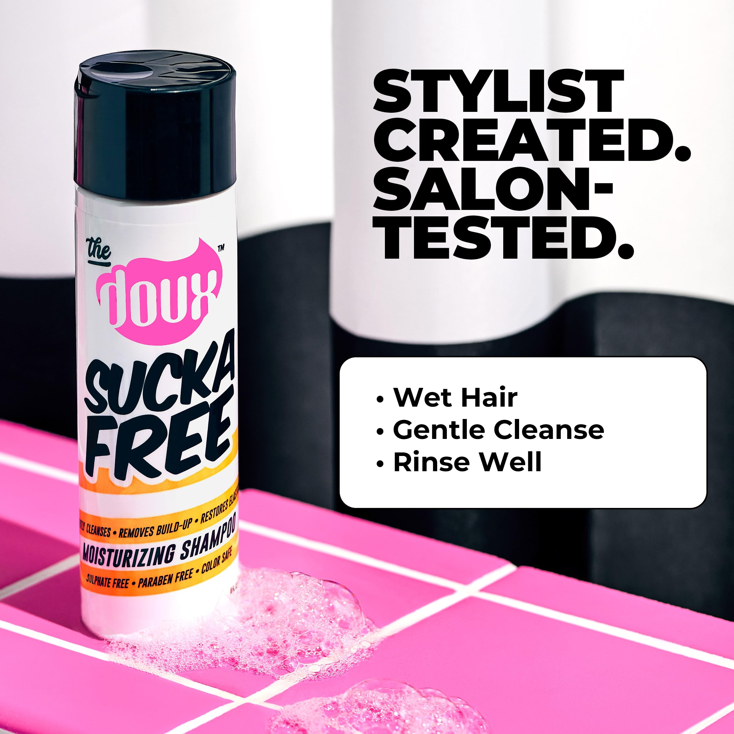The Doux SUCKA FREE shampoo lather closeup emphasizes creamy suds for smooth detangling.