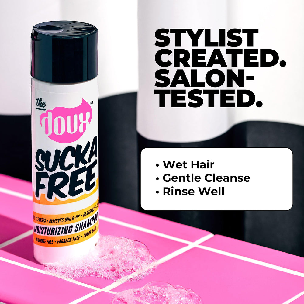 The Doux SUCKA FREE shampoo lather closeup emphasizes creamy suds for smooth detangling.