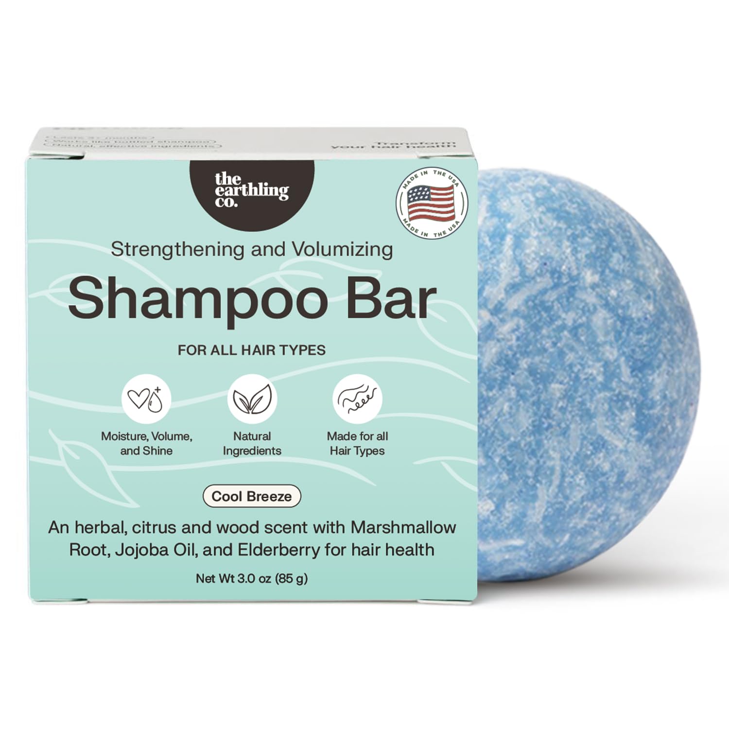The Earthling Co. shampoo bar lather close-up highlighting luxurious cleansing and moisturized hair.