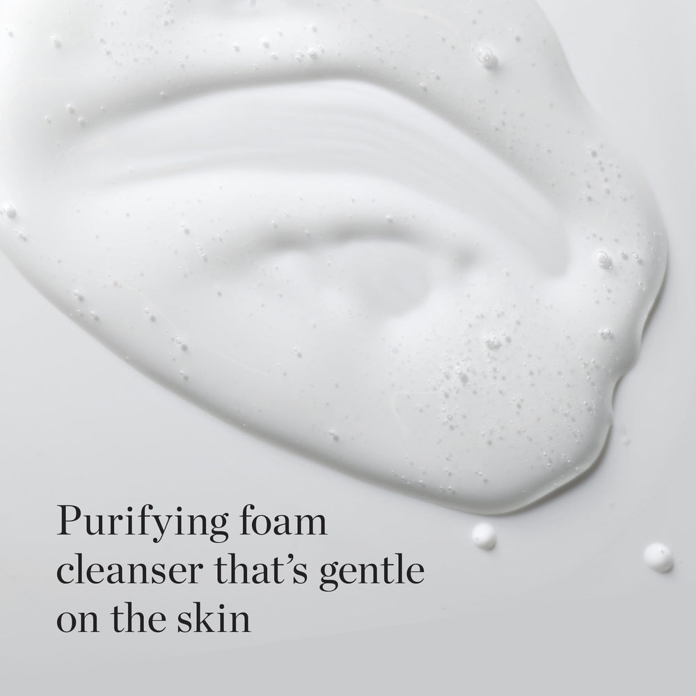 The Face Shop White Seed Exfoliating Cleansing Foam bottle closeup highlights texture and moisturizing formula.