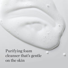 The Face Shop White Seed Exfoliating Cleansing Foam bottle closeup highlights texture and moisturizing formula.