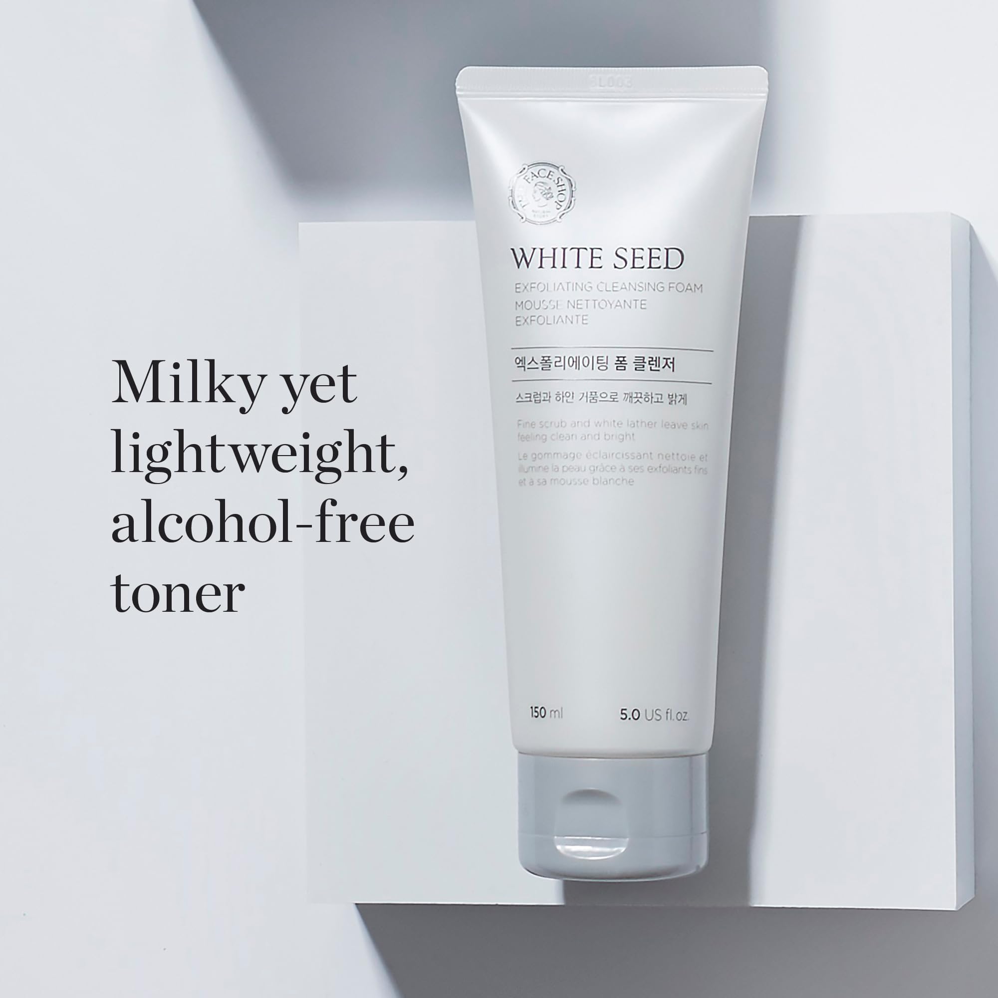 The Face Shop White Seed Exfoliating Cleansing Foam rinse scene suggests a clean finish.