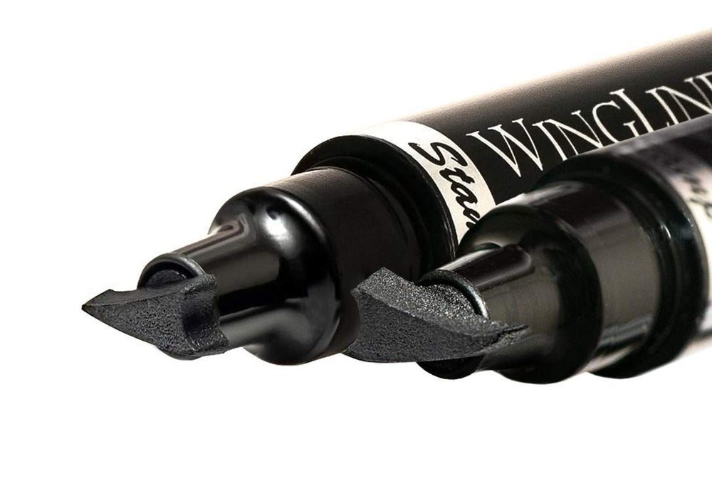 Midnight Black ink from The Flick Stick Winged Eyeliner Stamp on eyelid