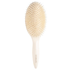 The Hair Edit Cream Finish and Shine brush product shot highlights boar bristles for healthy shine