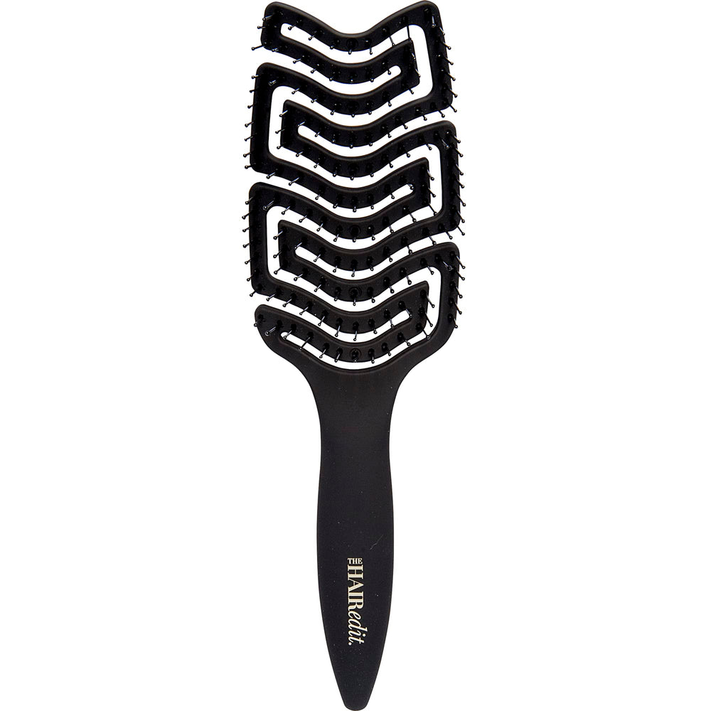 The Hair Edit detangle brush with ergonomic paddle for gentle wet or dry detangling.