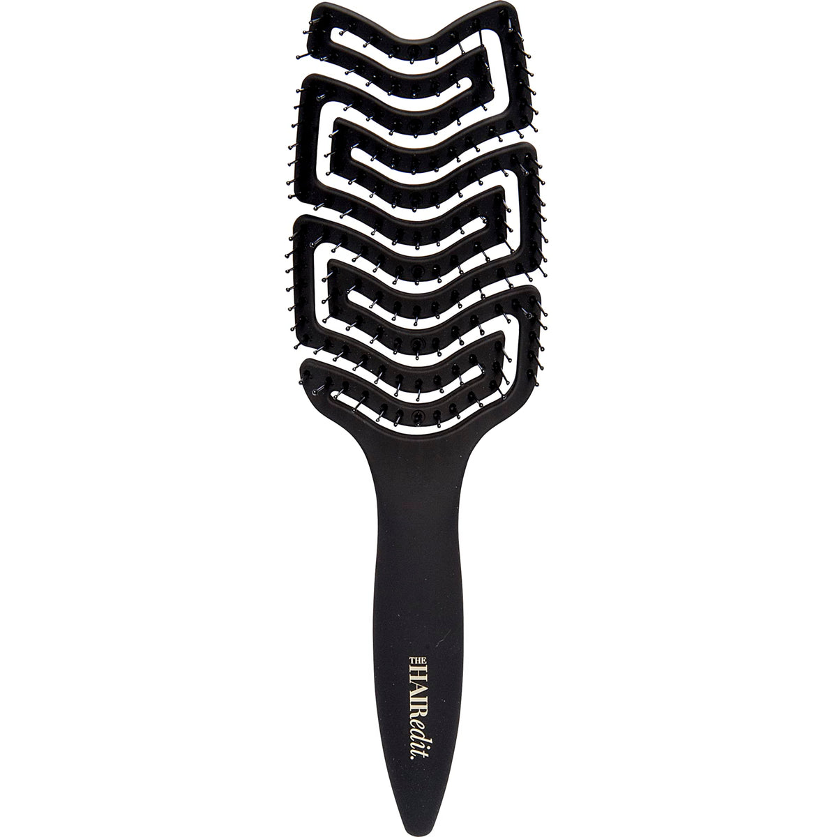 The Hair Edit detangle brush with ergonomic paddle for gentle wet or dry detangling.