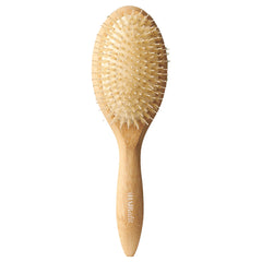The Hair Edit Glossifier bamboo brush with boar bristles for smoothing frizz and boosting shine.
