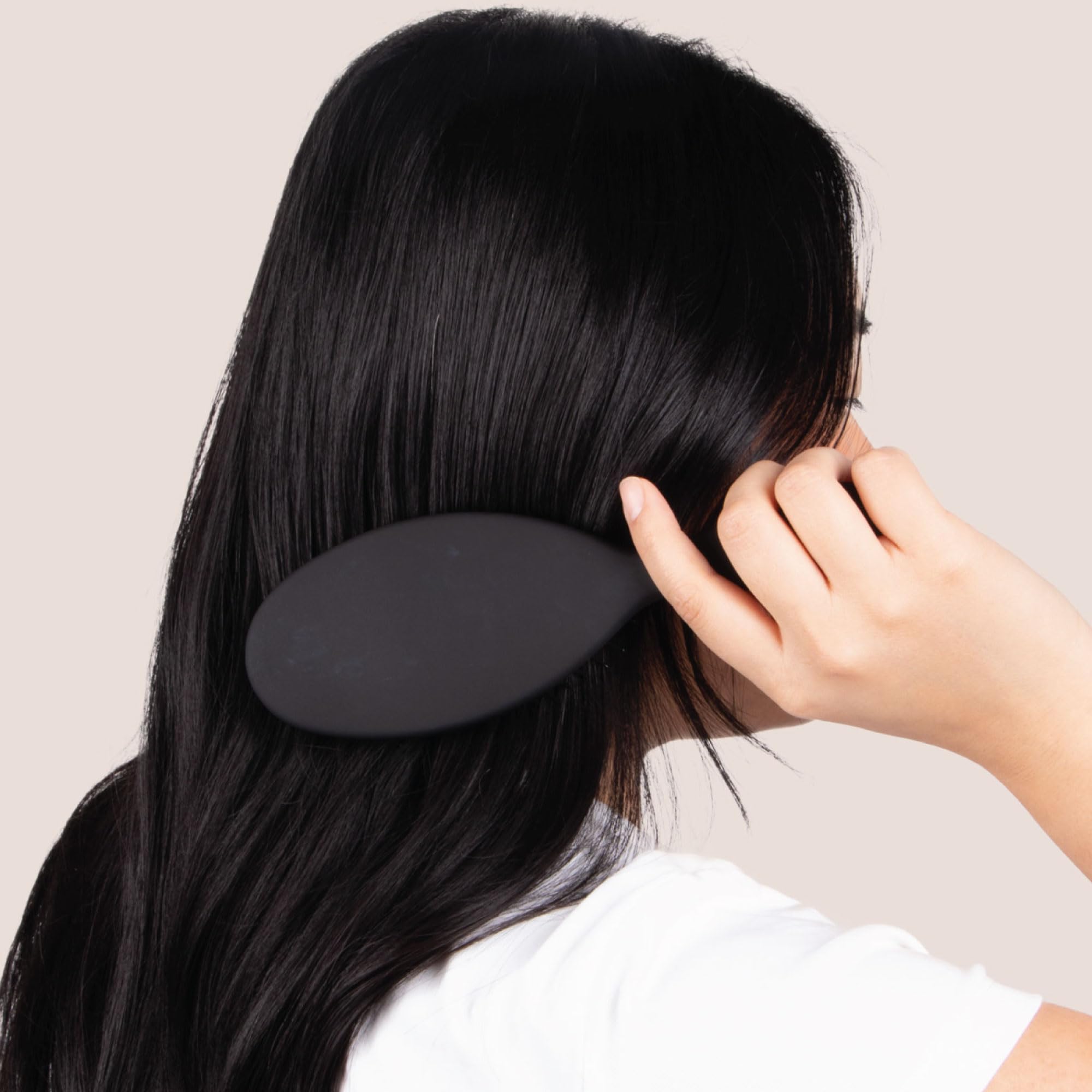 The Hair Shop Detangling Brush 909 glides wet or dry hair smoothly.