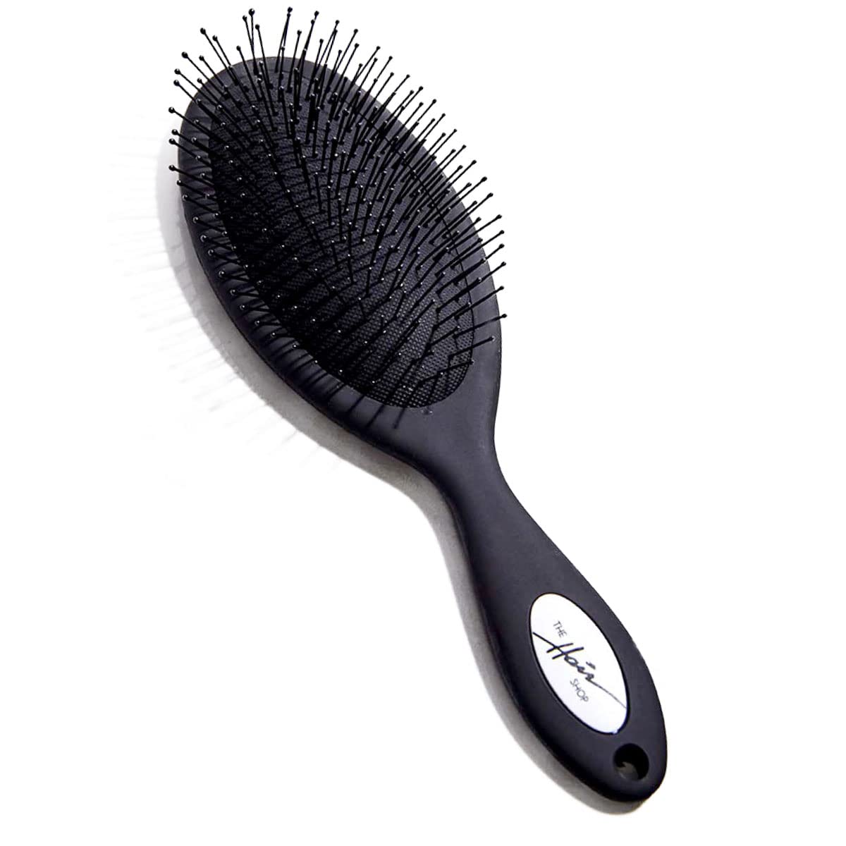 The Hair Shop detangling brush extensions glide through knots for seamless extension care.
