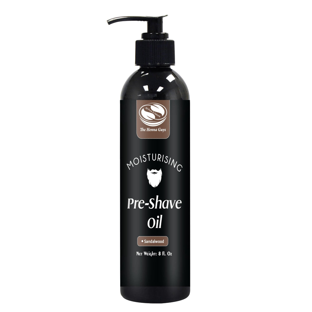 The Henna Guys pre-shave oil bottle in sandalwood scent for smoother shaves.