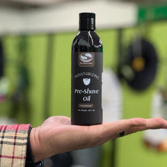 The Henna Guys pre-shave oil pour cap for easy, controlled application.
