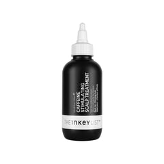 The INKEY List caffeine scalp treatment bottle boosts scalp stimulation for healthier-feeling hair