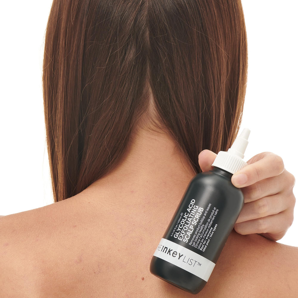 The INKEY List Glycolic Acid Exfoliating Scalp Scrub packaging with label and usage tips.