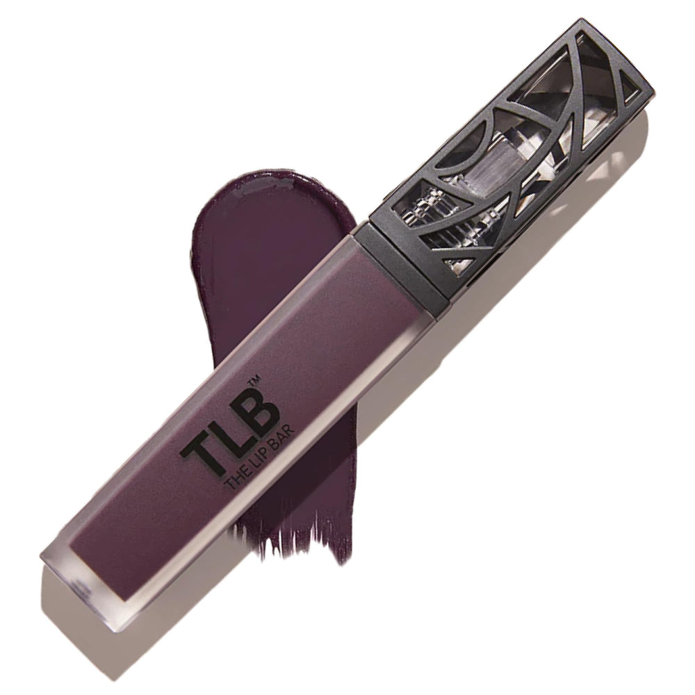 The Lip Bar Drama Queen deep eggplant liquid matte bottle shows bold color payoff.