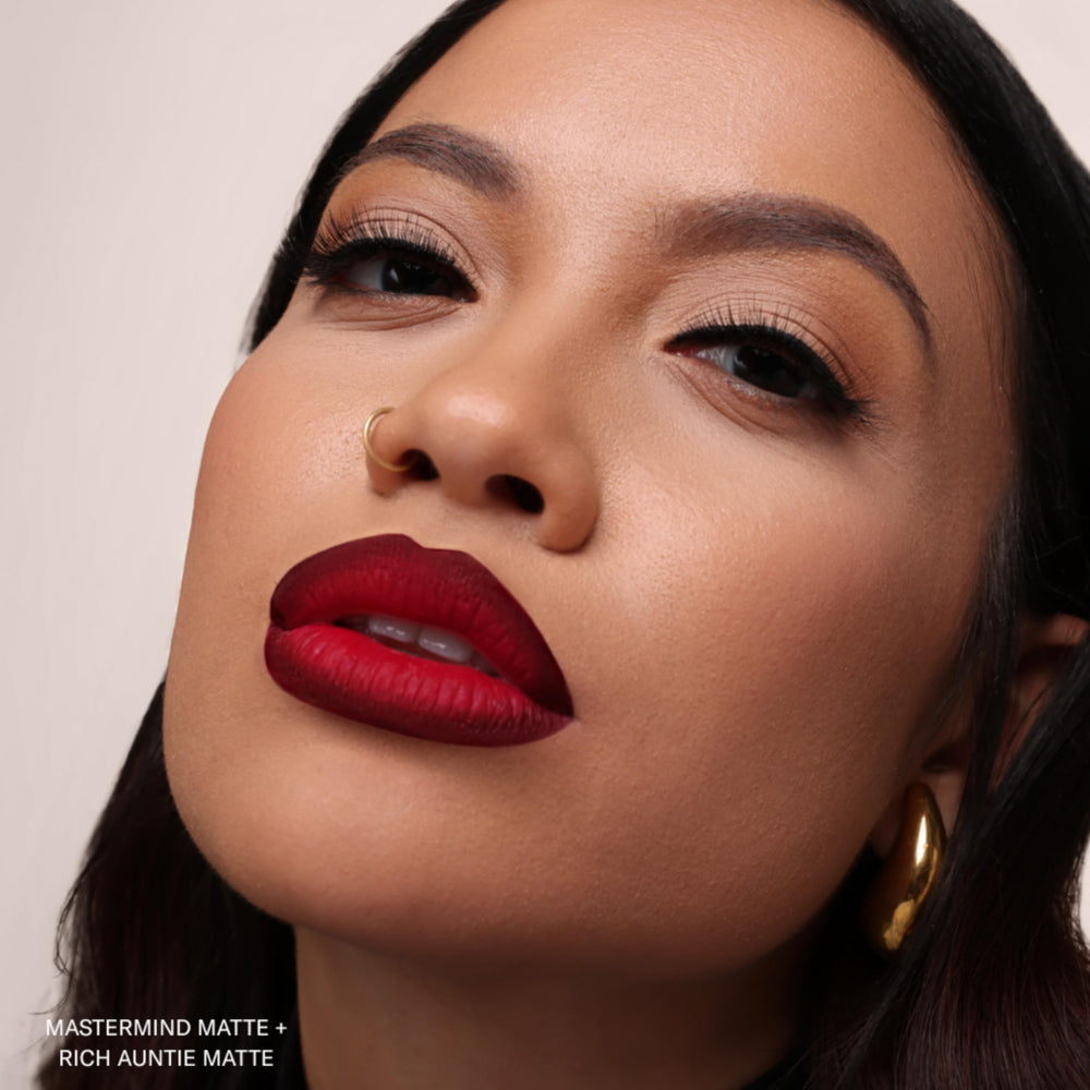 The Lip Bar high-shine gloss layer added to lipstick for extra radiance.