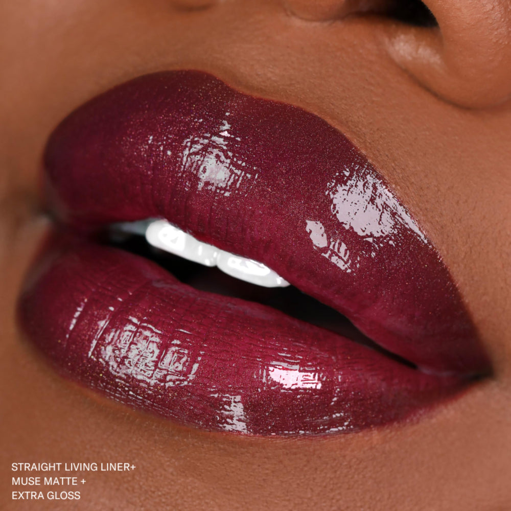 The Lip Bar jojoba oil vitamin E formula image highlights lip-conditioning benefits.