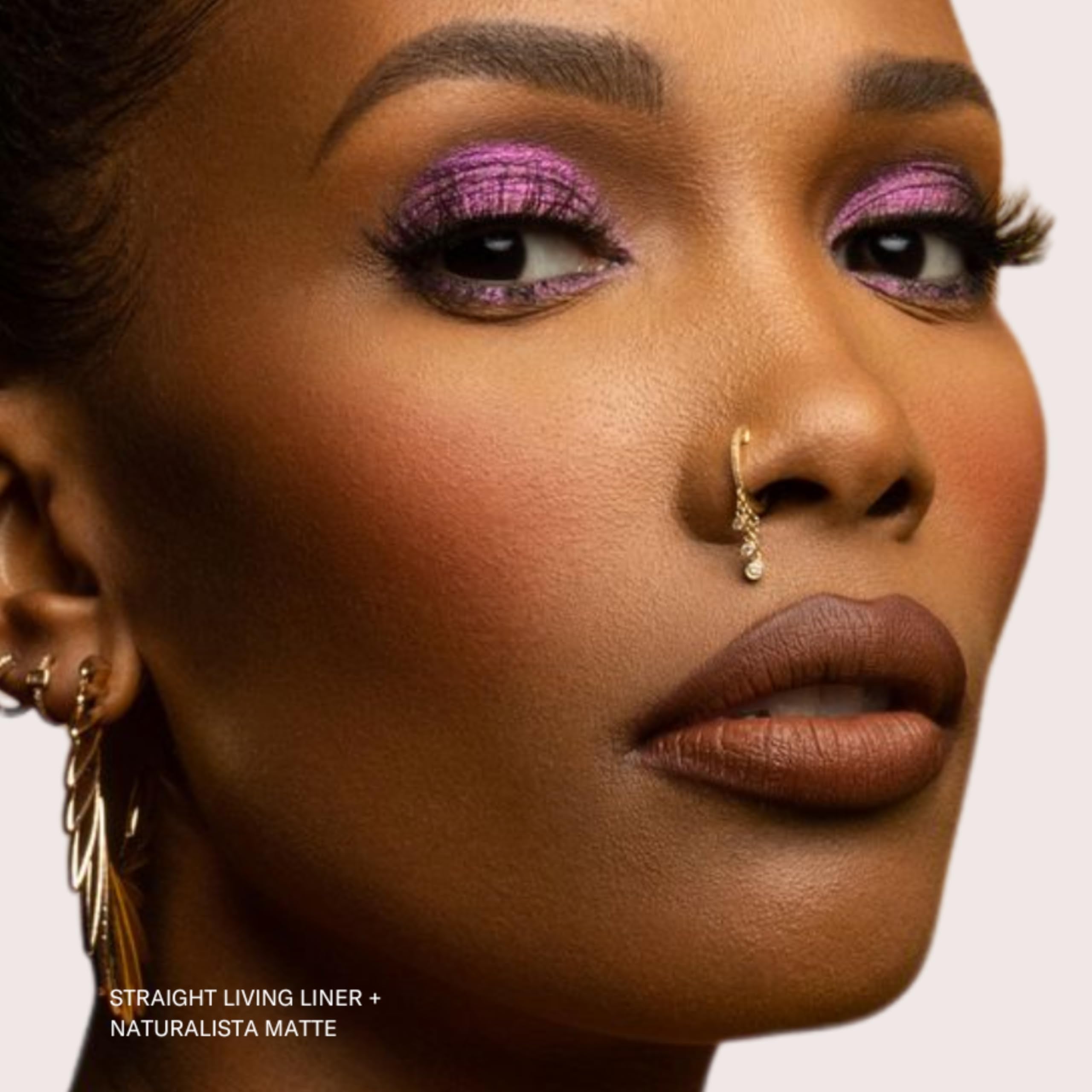 Vegan formula image emphasizes jojoba oil and vitamin E for lip care.