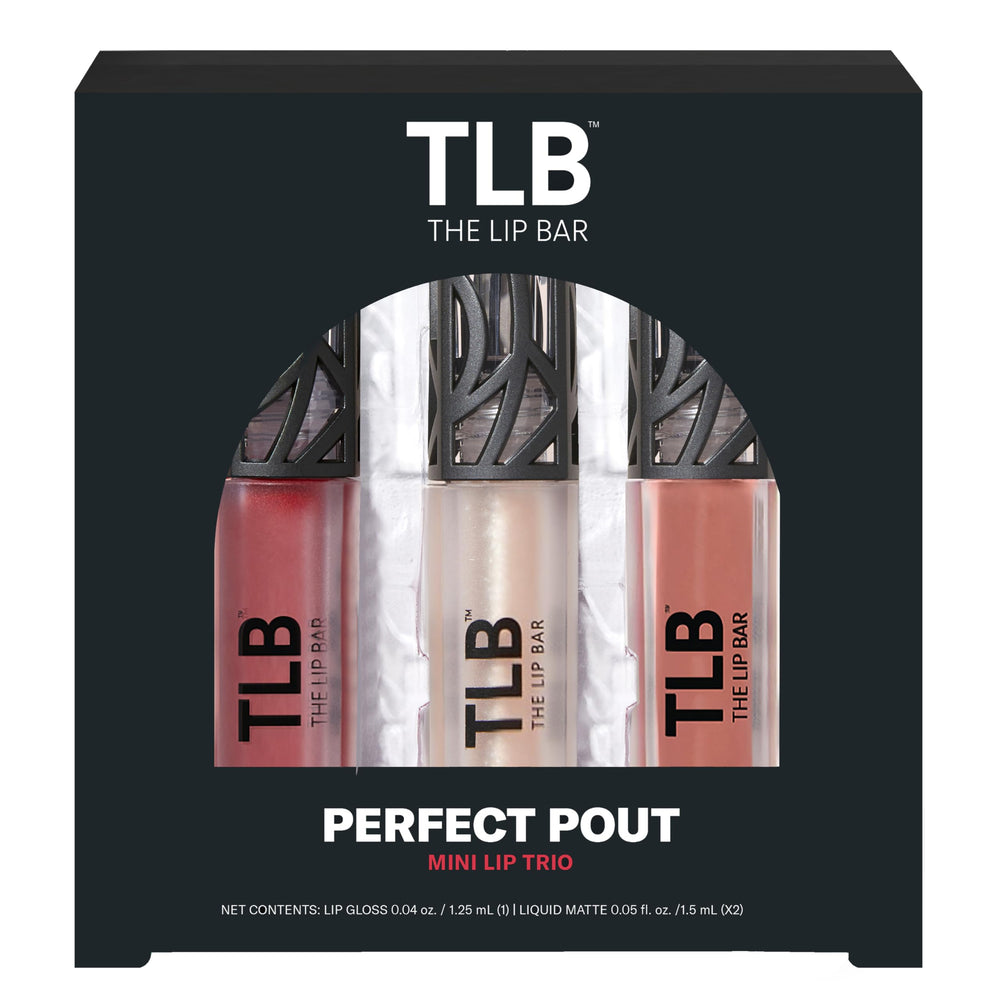 The Lip Bar Trophy Wife Gloss Up Lip Gloss swatch on lips for shimmering clear finish.