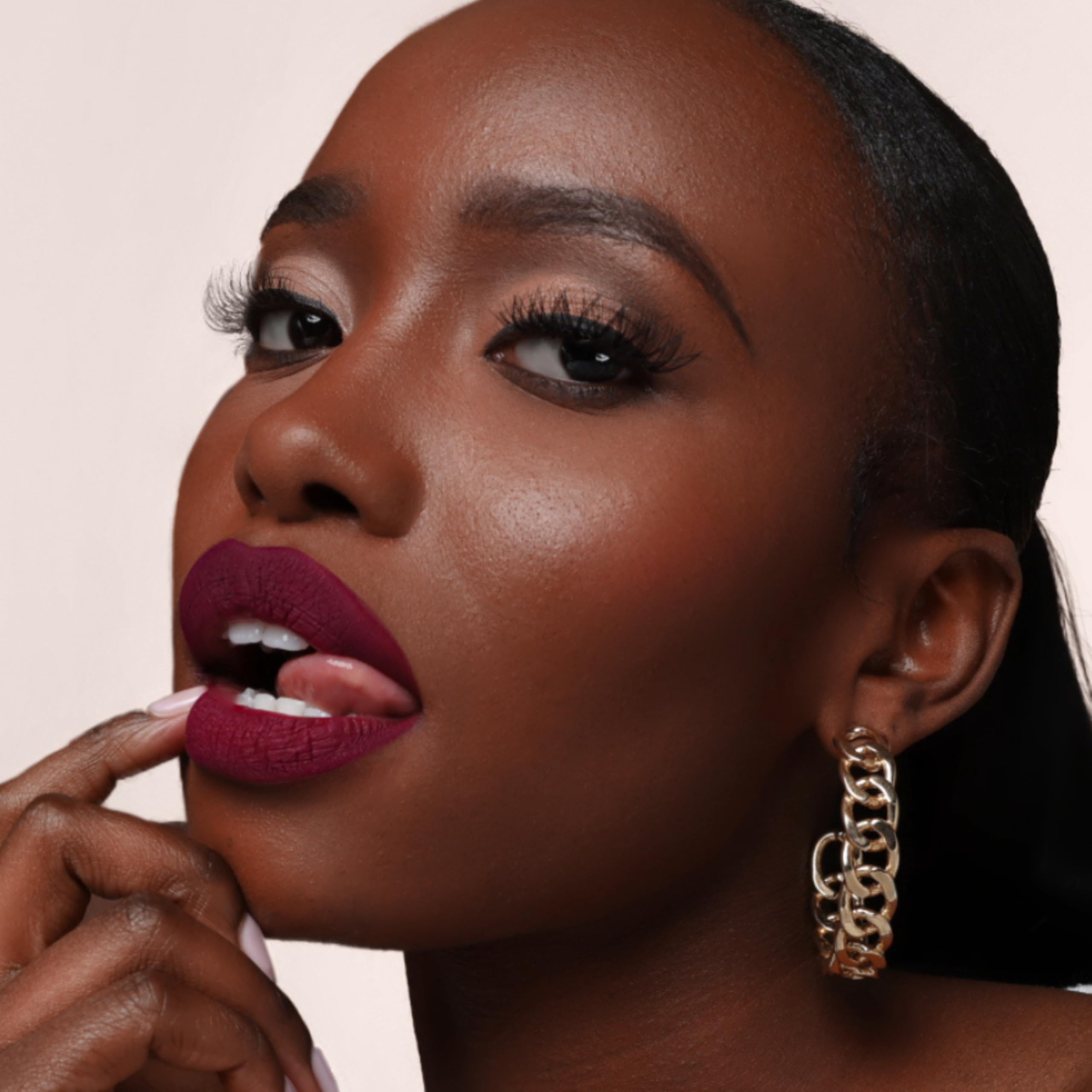 The Lip Bar vegan cruelty-free icon confirms ethical, non-toxic makeup choice.