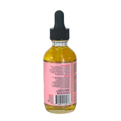 The Mane Attraction oil being applied to the scalp for soothing care