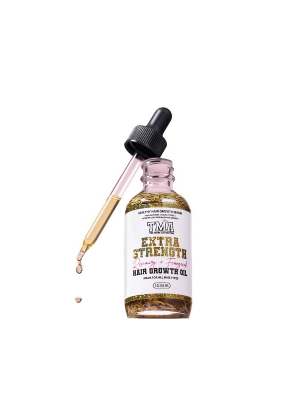 The Mane Attraction lightweight oil texture close-up demonstrates quick-absorbing hydration.