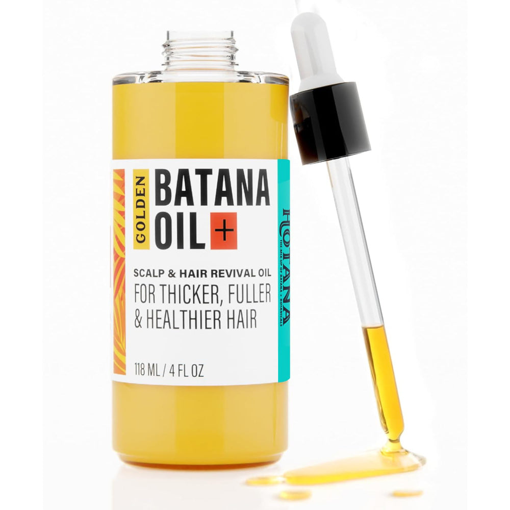 The-Mix-Up Golden Batana Oil bottle close-up showing a nourishing formula for hair health.