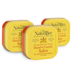 The Naked Bee Orange Blossom Honey Hand Salve tub closeup for soothing dry hands.