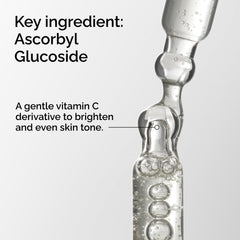 The Ordinary Ascorbyl Glucoside Solution 12% drops on hand, ready for application