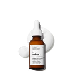The Ordinary Caffeine 3% + Escin 1% serum bottle energizes dull skin for a brighter look.