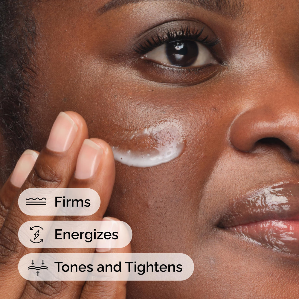 The Ordinary Caffeine + Escin serum massaging upward on skin.