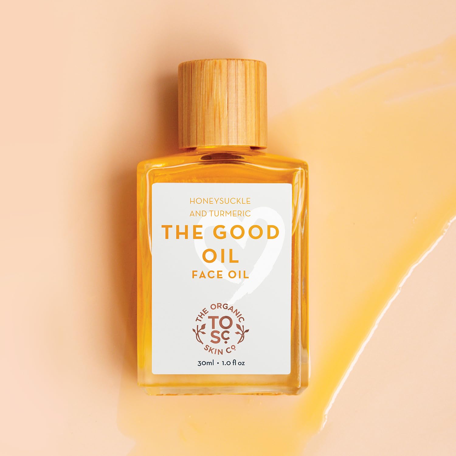 Spa-like honeysuckle scent scene with The Organic Skin Co serum for a relaxing facial routine.