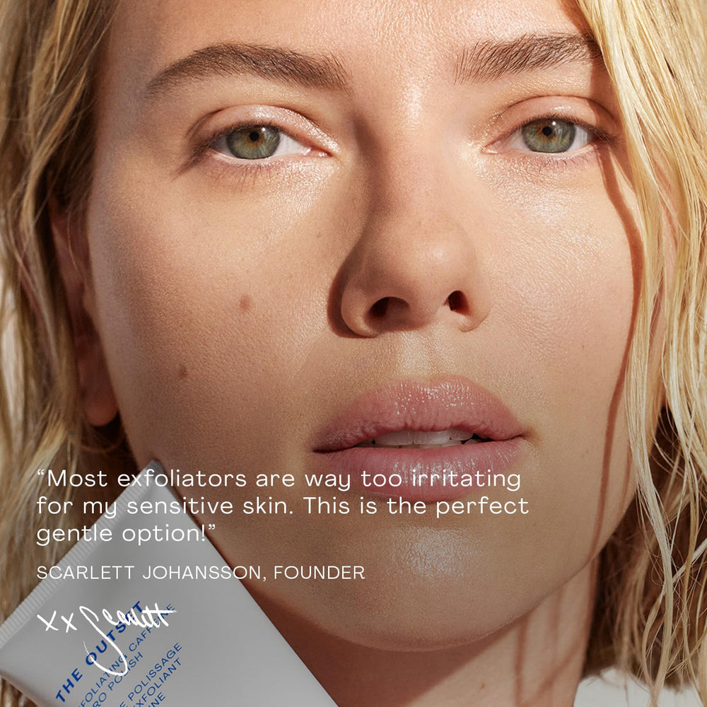The Outset Exfoliating Caffeine Micro Polish rinse-off moment with water drop demonstrates cleansing ritual.