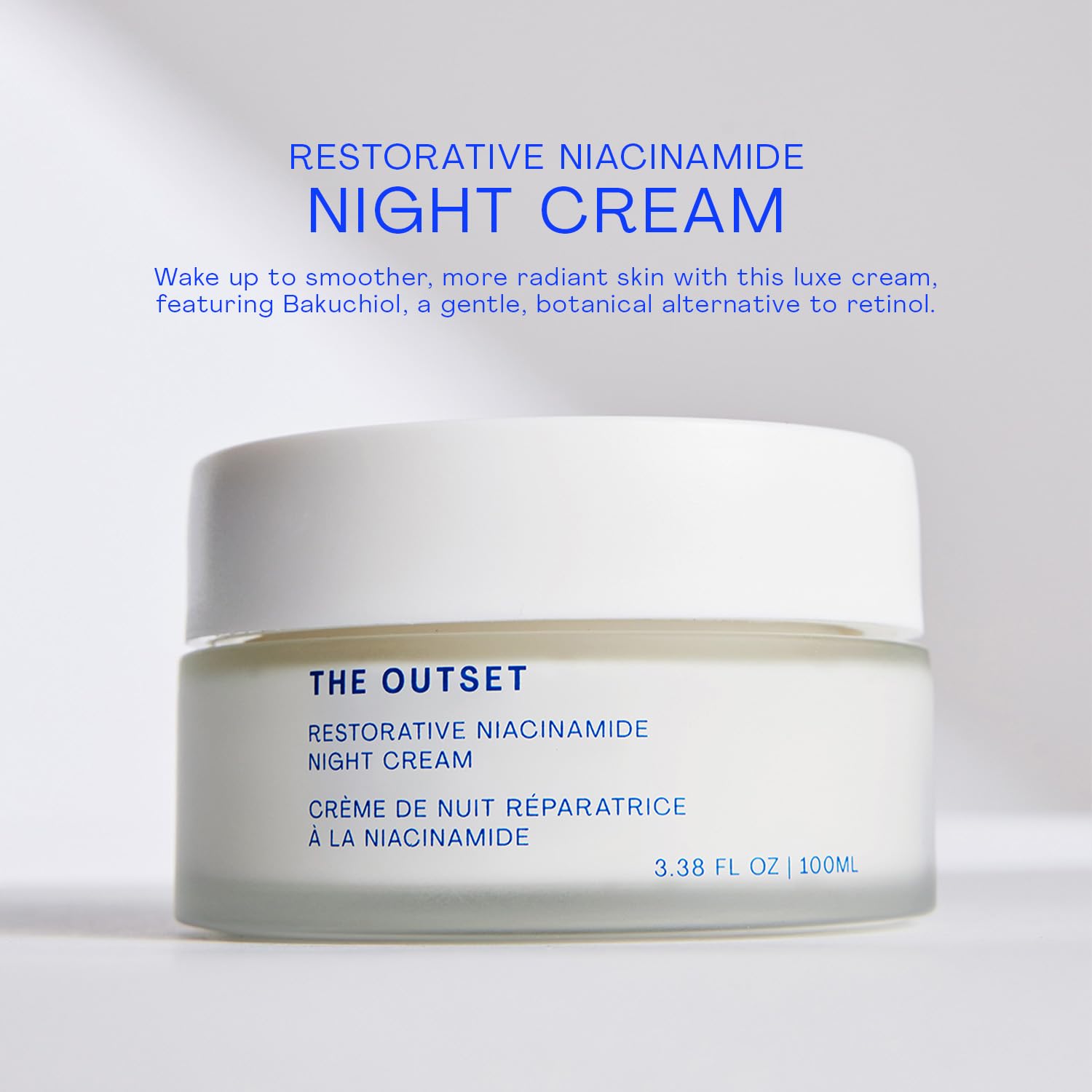 The Outset Restorative Night Cream bottle close-up showing fragrance-free formula.