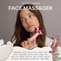 The Skinny Confidential Face Roller pink balls eye area for gentle depuffing.